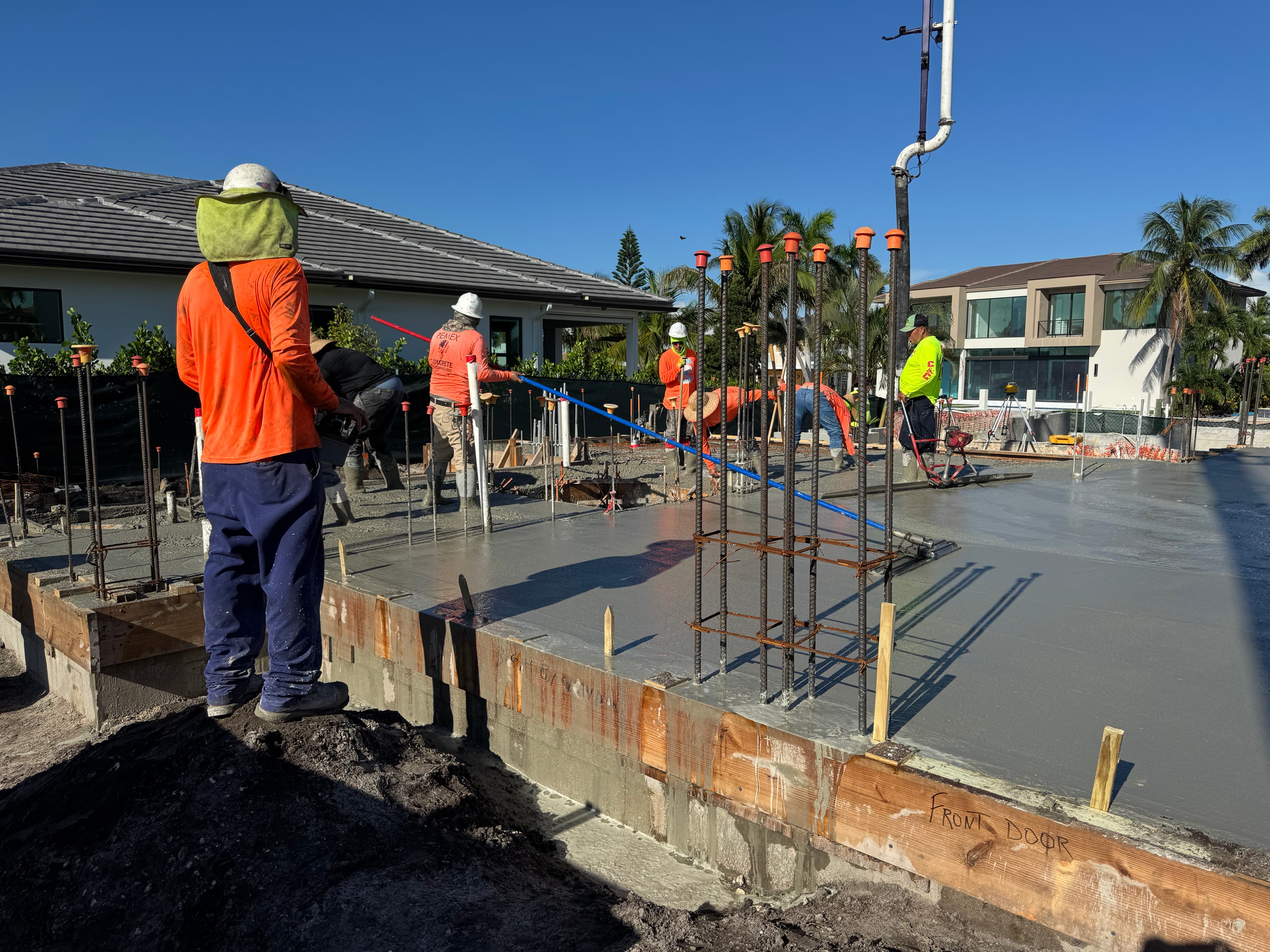 Lighthouse Point Canal Home — concrete pour with luxury waterfront neighborhood